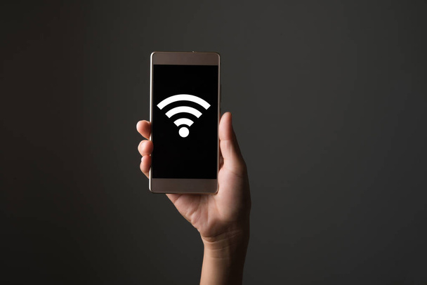 Wifi icon on smart phone screen - Foto, afbeelding