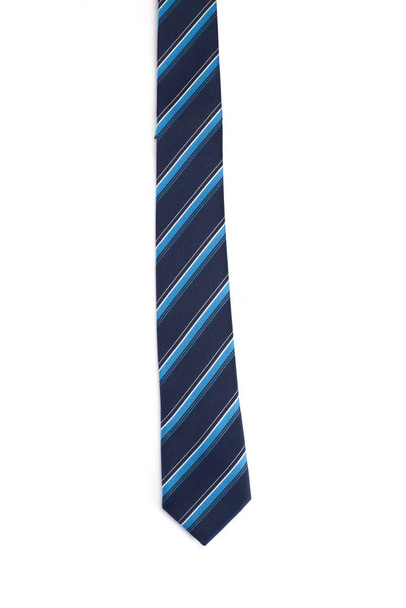 Сине-белый галстук на белом фоне
. - Фото, изображение