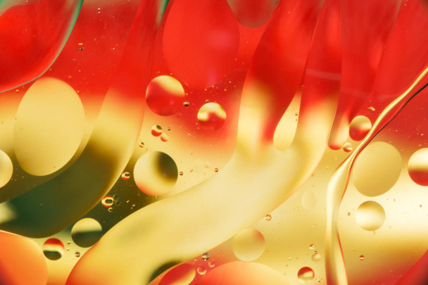 mix oil and water, color background with soft defocusing, macro abstract - Fotoğraf, Görsel