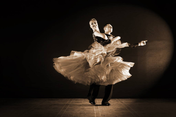 dancers in ballroom isolated on black background - Foto, afbeelding