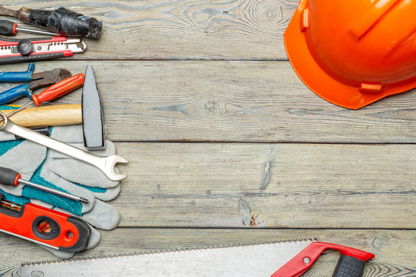 Variety of work tools on wooden background - Photo, Image
