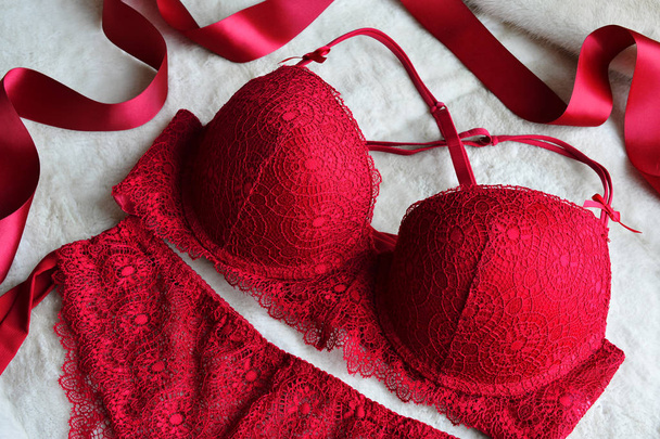 Women's lace sexy underwear of red, wine color: bra and panties. - Zdjęcie, obraz