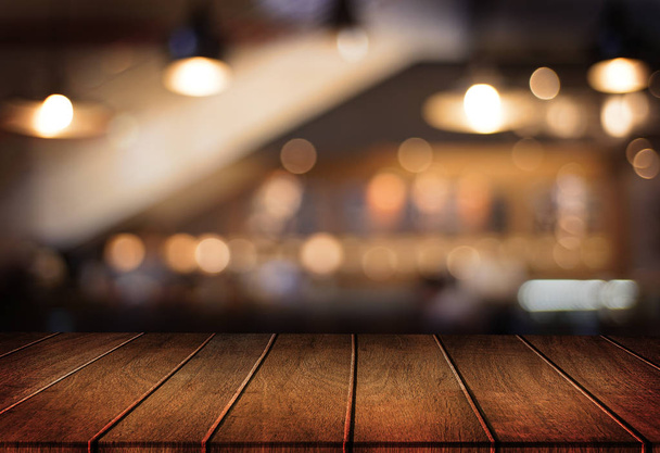 Wooden board empty table  cafe, coffee shop, bar blurred backgro - 写真・画像