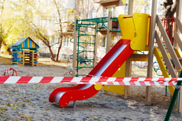 Colorful Empty Playground by a police line - Photo, Image