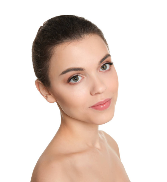 Young woman with beautiful makeup on white background. Professional cosmetic products - Фото, зображення