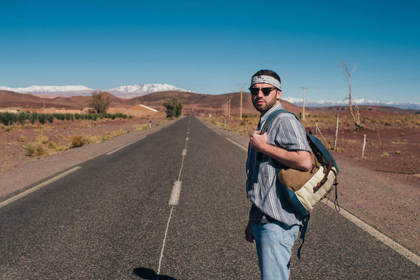 A person who rides hitchhiker - Фото, изображение