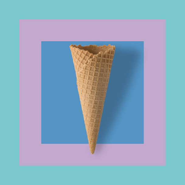 Ice cream cone on pastel colorful background.  - Foto, afbeelding