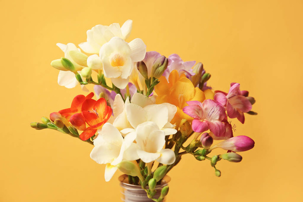 Beautiful freesia flowers on color background - Foto, Imagen