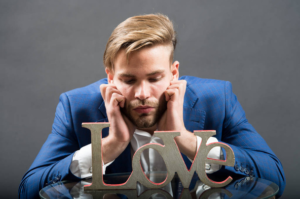 Businessman look at love word, valentines day - Photo, image