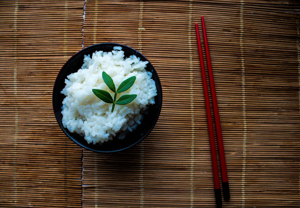 a plate of rice and chopsticks - Photo, Image