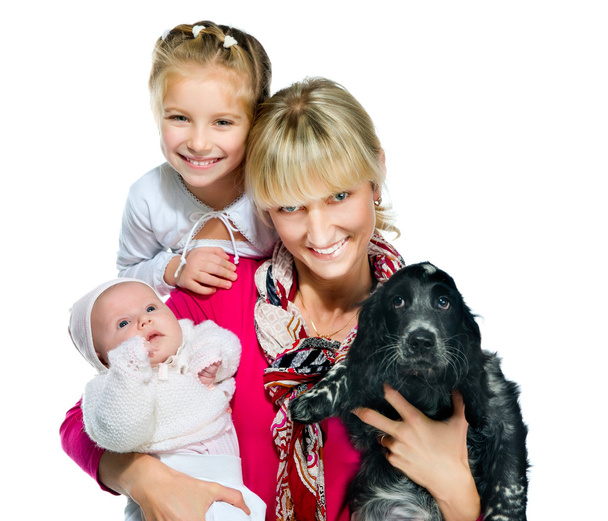 Pretty young woman with her daughters and dog - Фото, зображення