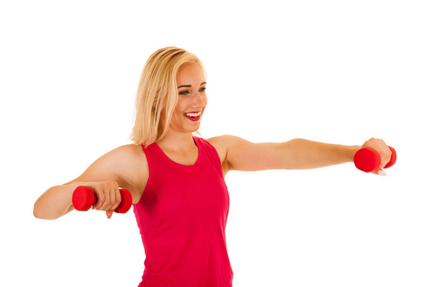Active sporty woman works out with dumbbells isolated over white - Φωτογραφία, εικόνα