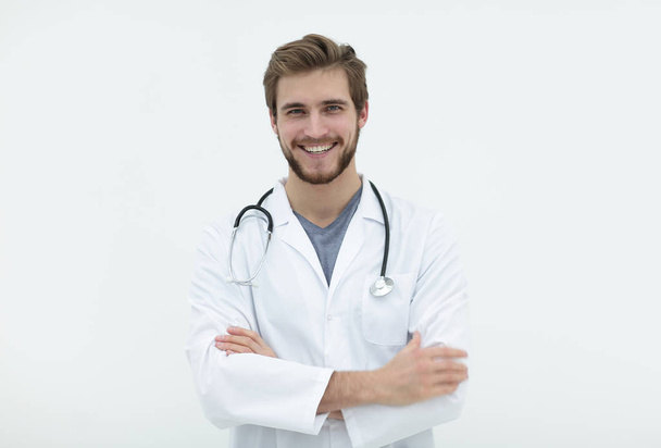 portrait of a friendly doctor.isolated on white - Fotó, kép