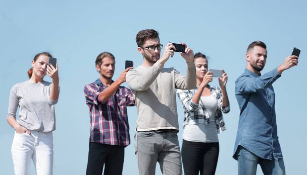 team of successful young people making selfie - Foto, Imagen
