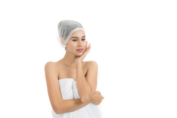 Beautiful spa woman showing perfect skin with copy space isolated on white. - Photo, Image