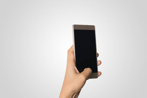 Vrouw Hand met slimme telefoon leeg scherm. Kopieer ruimte. Hand met smartphone geïsoleerd op witte achtergrond - Foto, afbeelding