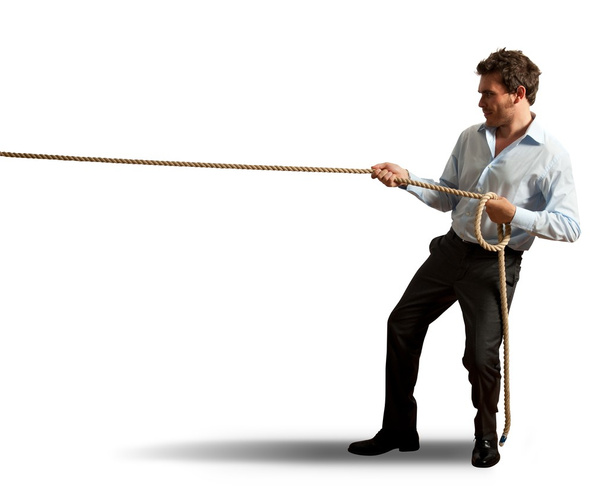 Businessman pulling rope - Zdjęcie, obraz