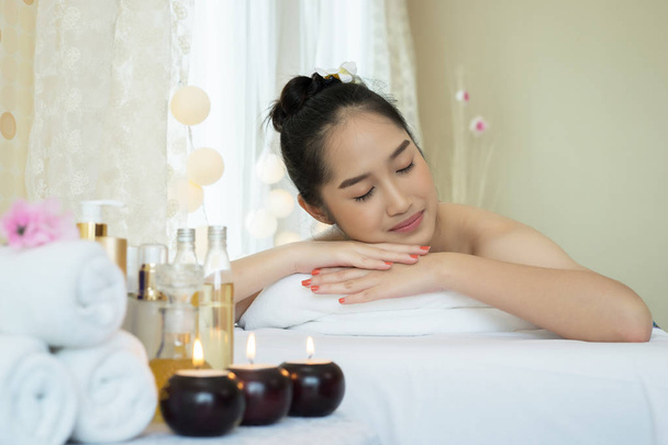 Close up of Young beautiful woman relaxing during spa treatment - 写真・画像