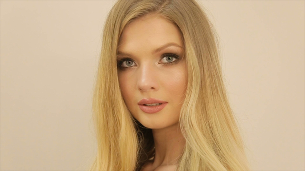 Portrait of a blond model with makeup - Footage, Video