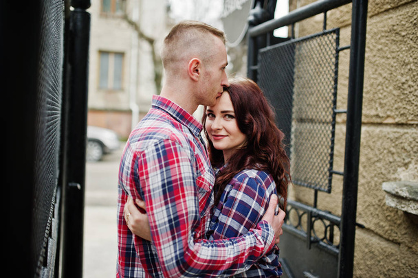 Stylish couple wear on checkered shirt in love together. - Φωτογραφία, εικόνα