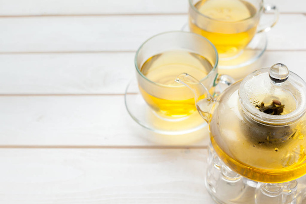 Aromatic fresh tea on wooden table - Zdjęcie, obraz