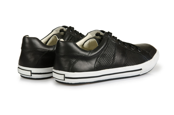 Chaussures de sport en chaussures de sport concept sur blanc
 - Photo, image