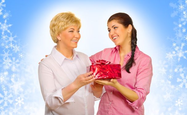 Young woman giving gift to her mother - Foto, Imagem