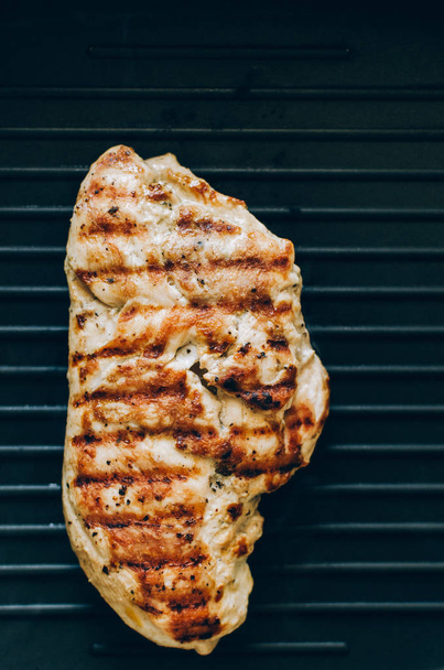 Grilled chicken steak on the grill - Photo, image