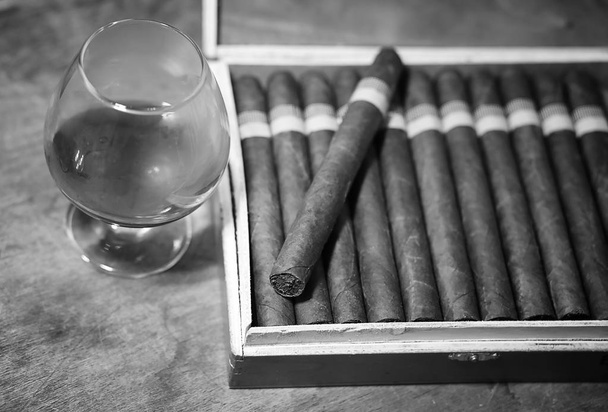 Large box of Cuban cigars on a wooden table - Photo, Image