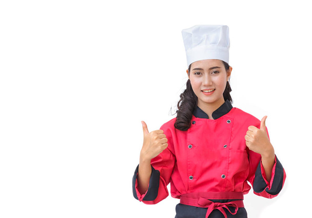 Улыбающаяся шеф-повар в красной форме показывает большие пальцы вверх жест изол
 - Фото, изображение