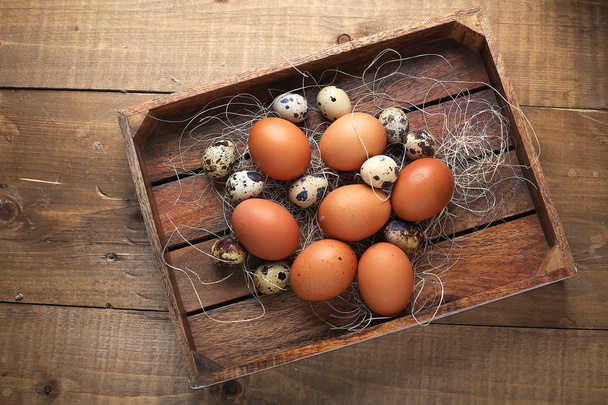 Eggs in the village on the table. The farms products. Fresh foo - Photo, Image
