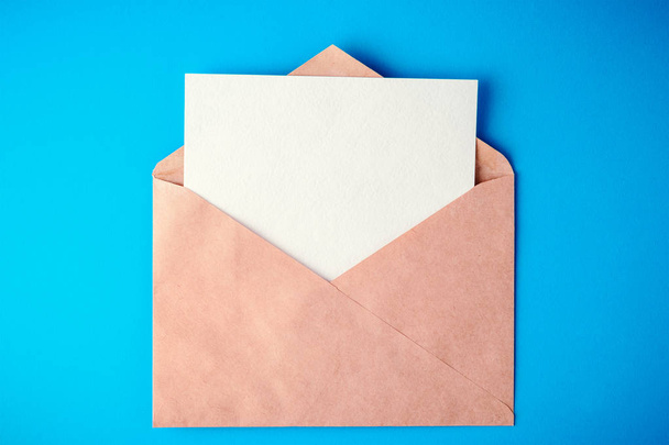 envelope on blue background with shadows - Foto, afbeelding