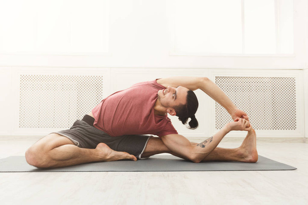 Fitness man at legs stretching training - Photo, Image