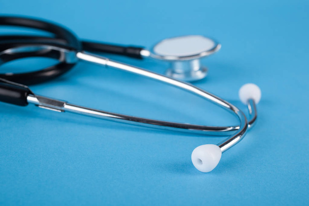 Stethoscope (phonendoscope) isolated on blue background, medical - Photo, Image