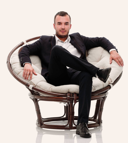 young businessman sitting in a comfortable chair - Photo, Image