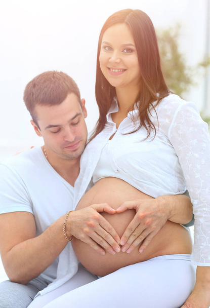 closeup .happy pregnant couple. - Фото, изображение