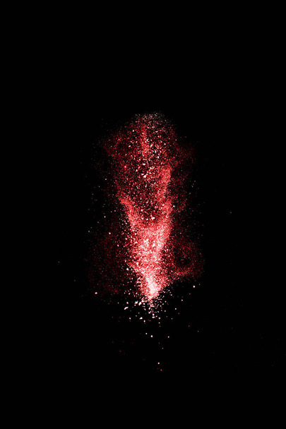 Punainen ja valkoinen pöly räjähdys eristetty mustalla pohjalla
 - Valokuva, kuva