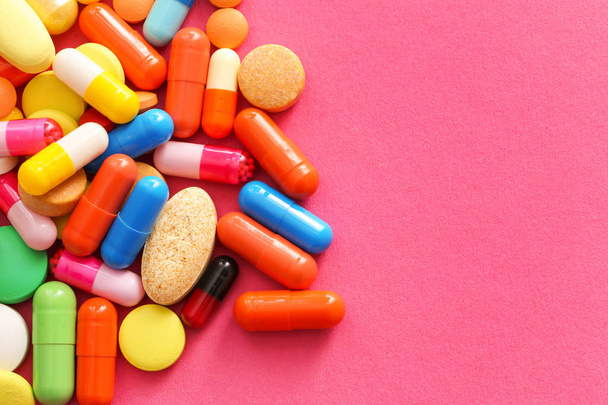 Different pills on color background - Fotó, kép