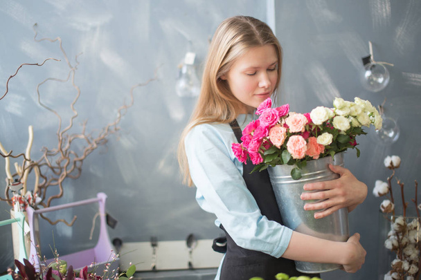 heart of young florist. lover of beauty - Φωτογραφία, εικόνα