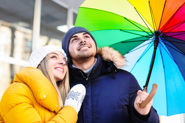 romantic couple with colorful umbrella - Photo, image