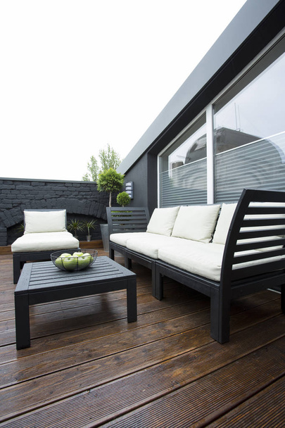 Furniture on terrace of apartment - Фото, изображение