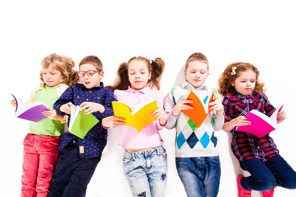 The cute children with books - 写真・画像