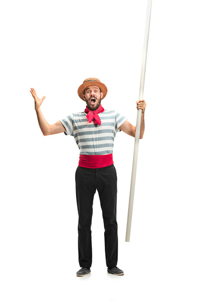 Caucasian man in traditional gondolier costume and hat - Fotoğraf, Görsel