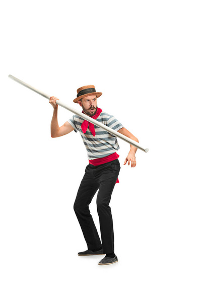 Caucasian man in traditional gondolier costume and hat - Foto, afbeelding