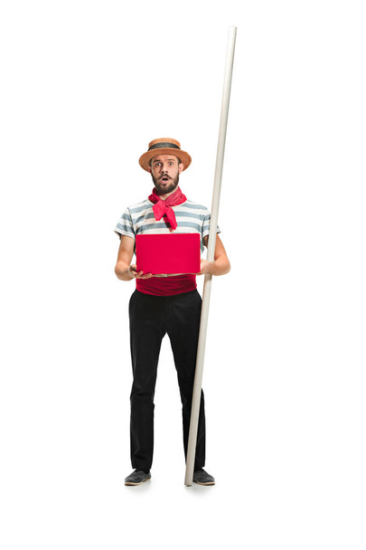 Caucasian man in traditional gondolier costume and hat - Foto, afbeelding