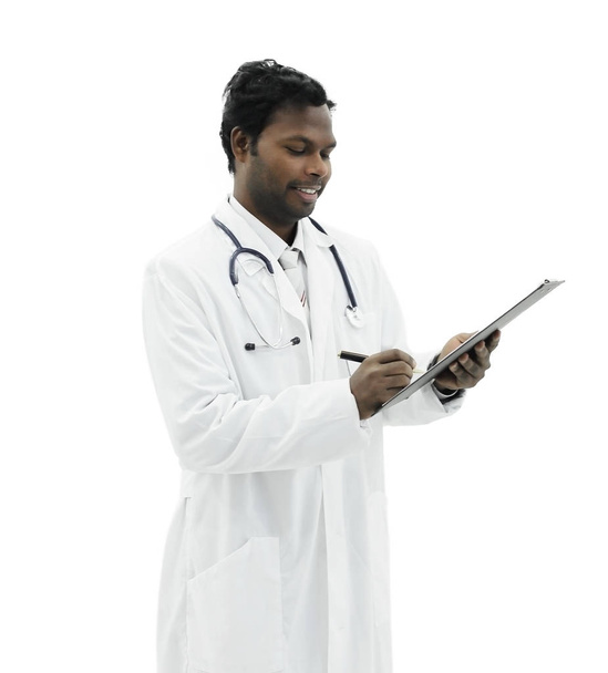 General practitioner writing a prescription for a patient - Φωτογραφία, εικόνα
