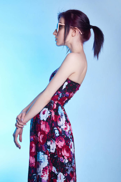 woman in sunglasses and flower dress - 写真・画像