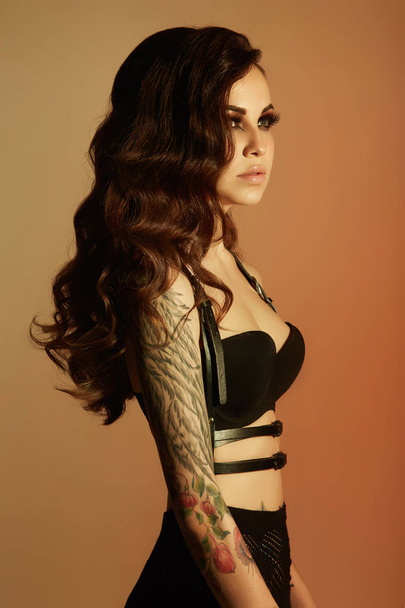 Young sexy woman with tattoo - Φωτογραφία, εικόνα