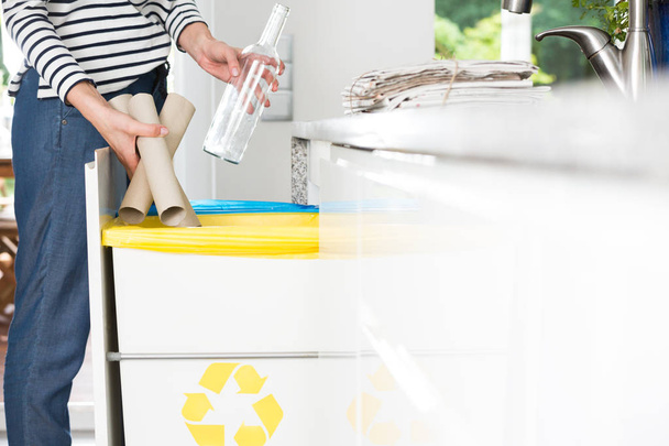 Housewife throwing paper into bin - Photo, Image