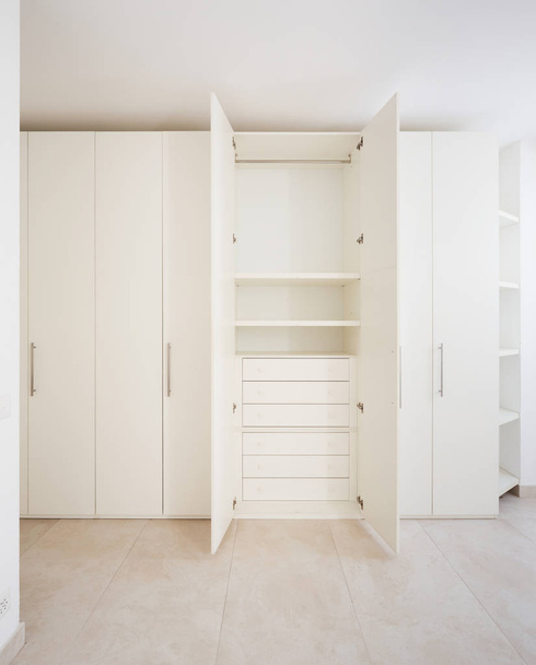 Open wardrobe in a modern house - Фото, изображение